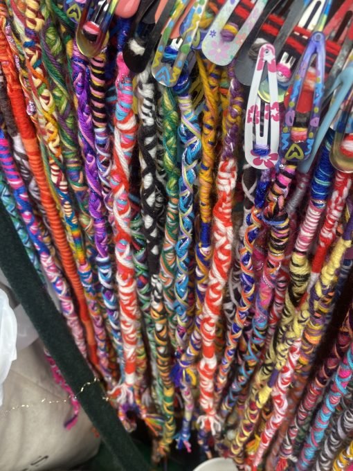 Clip on handmade /woven multi coloured hair wraps/braids